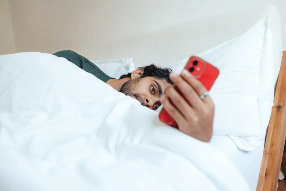 man taking ages to reply texts